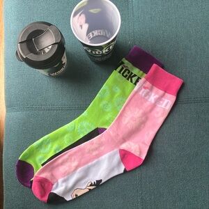 Wicked Broadway set. Socks (one size) never worn and 2 drinking cups.
